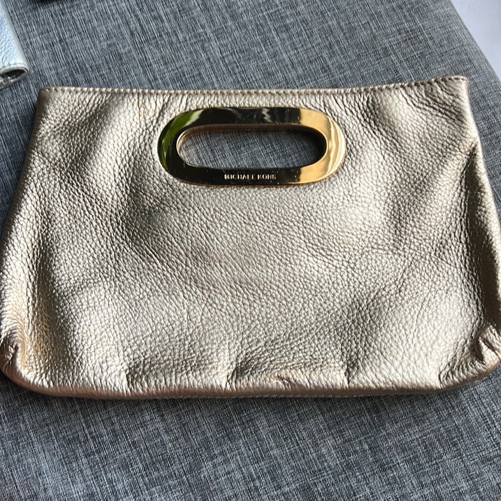 Pre loved MICHAEL KORS Gold Leather Clutch.